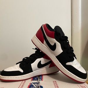 Youth black and red Jordan 1 lows